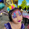 Girl with Unicorn Face Painting at Birthday Party | Confetti Jar