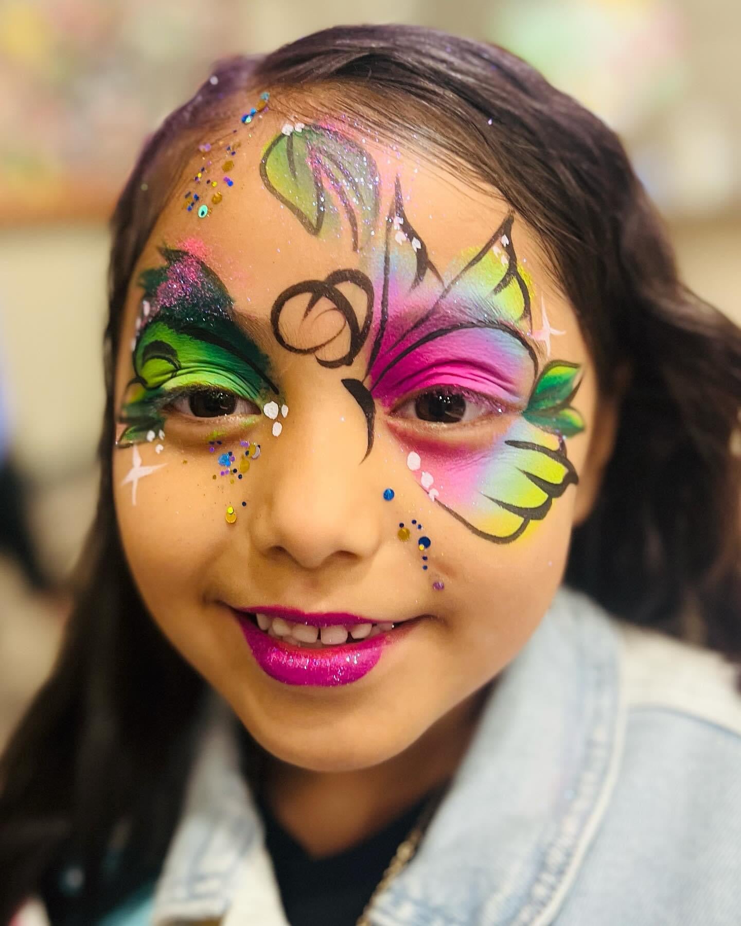 Girl with Butterfly Face Painting at Birthday Party | Confetti Jar