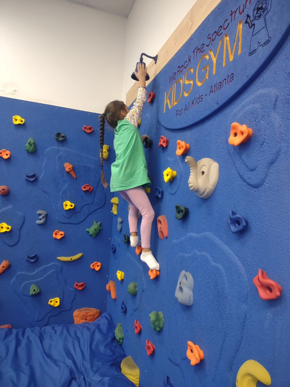 Climbing Wall at We Rock the Spectrum 
Kids Gym Roswell | Confetti Jar